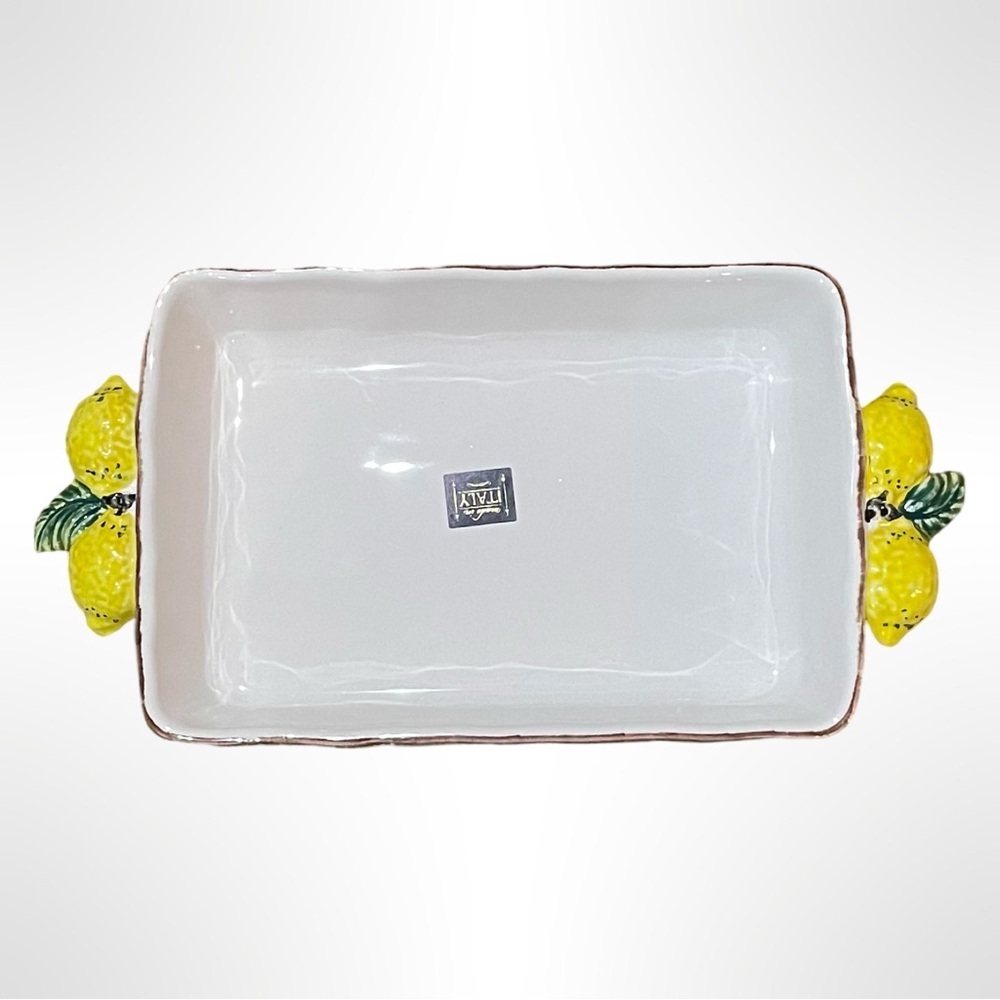 White Ceramic casserole dish with Lemon Accents handles.‎ La Cermica